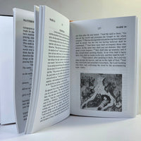 Open book with text and a black and white illustration on a white background