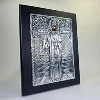 Orthodox icon of Saint Ephraim of Nea Makri with silver embossed design on wooden panel