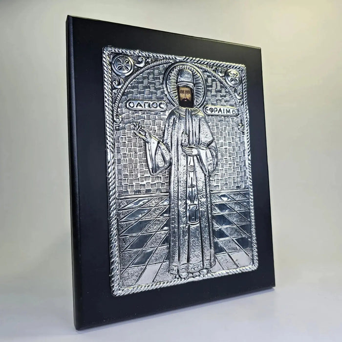 Orthodox icon of Saint Ephraim of Nea Makri with silver embossed design on wooden panel